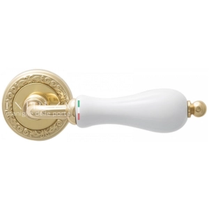 Дверная ручка Extreza DANA (Дана) 305 на розетке R06 полированное золото F01