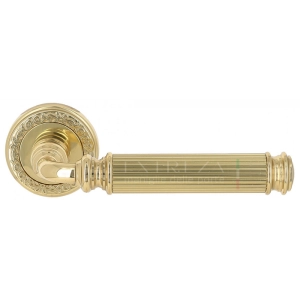 Дверная ручка Extreza BENITO (Бенито) 307 на розетке R06 полированная латунь F01