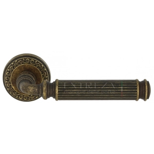 Дверная ручка Extreza BENITO (Бенито) 307 на розетке R06 античная бронза F23