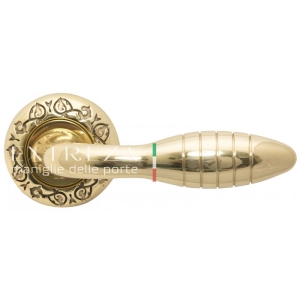 Дверная ручка Extreza MIREL (Мирел) 316 на розетке R04 полированное золото F01