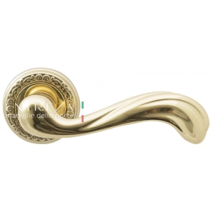 Дверная ручка Extreza NINA (Нина) 317 на розетке R06 полированное золото F01