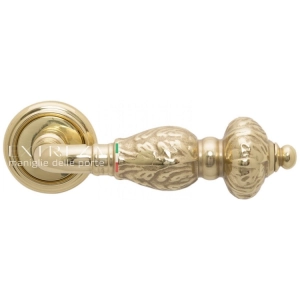 Дверная ручка Extreza TESLA (Тесла) 315 R01 полированное золото F01