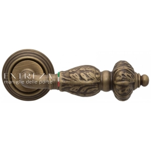 Дверная ручка Extreza TESLA 315 R05 матовая бронза F03 Подробное описание