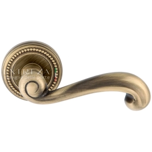 Дверная ручка Extreza BERTA (Берта) 312 на розетке R03 матовая бронза